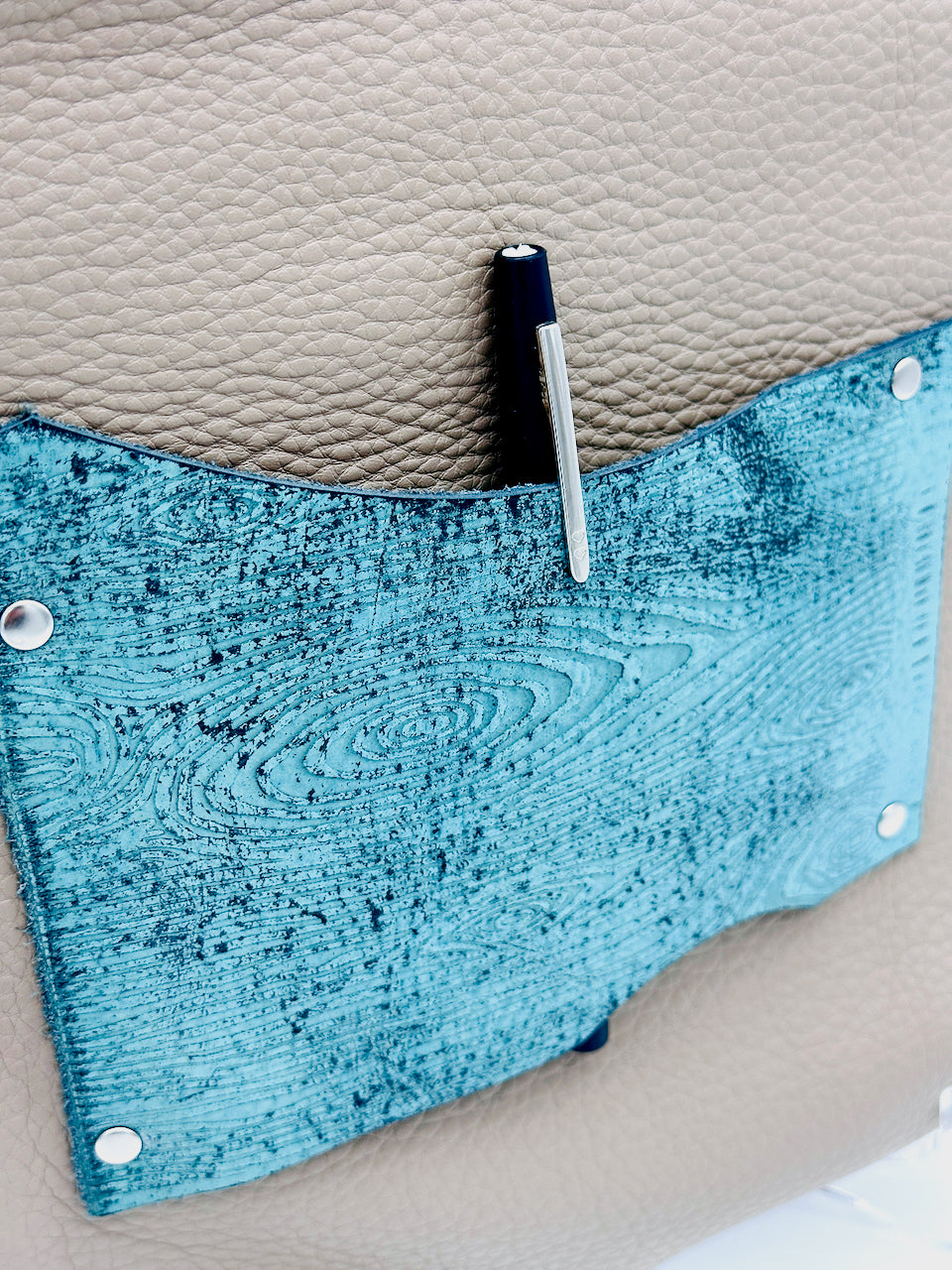 pen storage holder flap on leather journal created by Undercover Popular Leather Goods