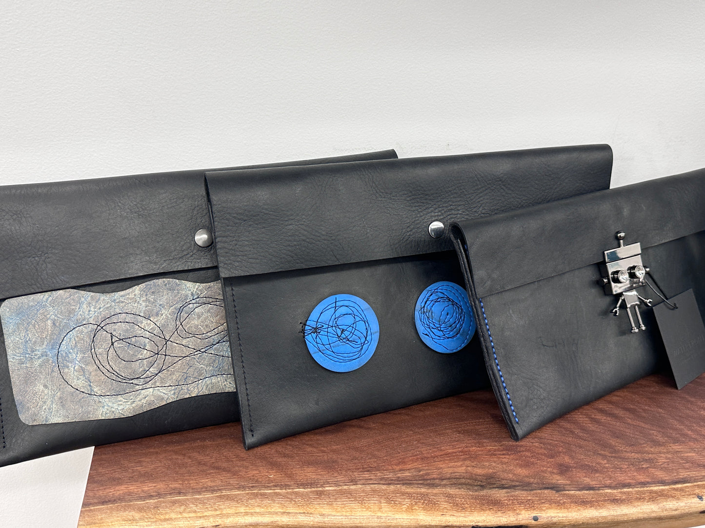 Black Leather Clutch Purse with Upcycled Industrial Rubber Band Circles
