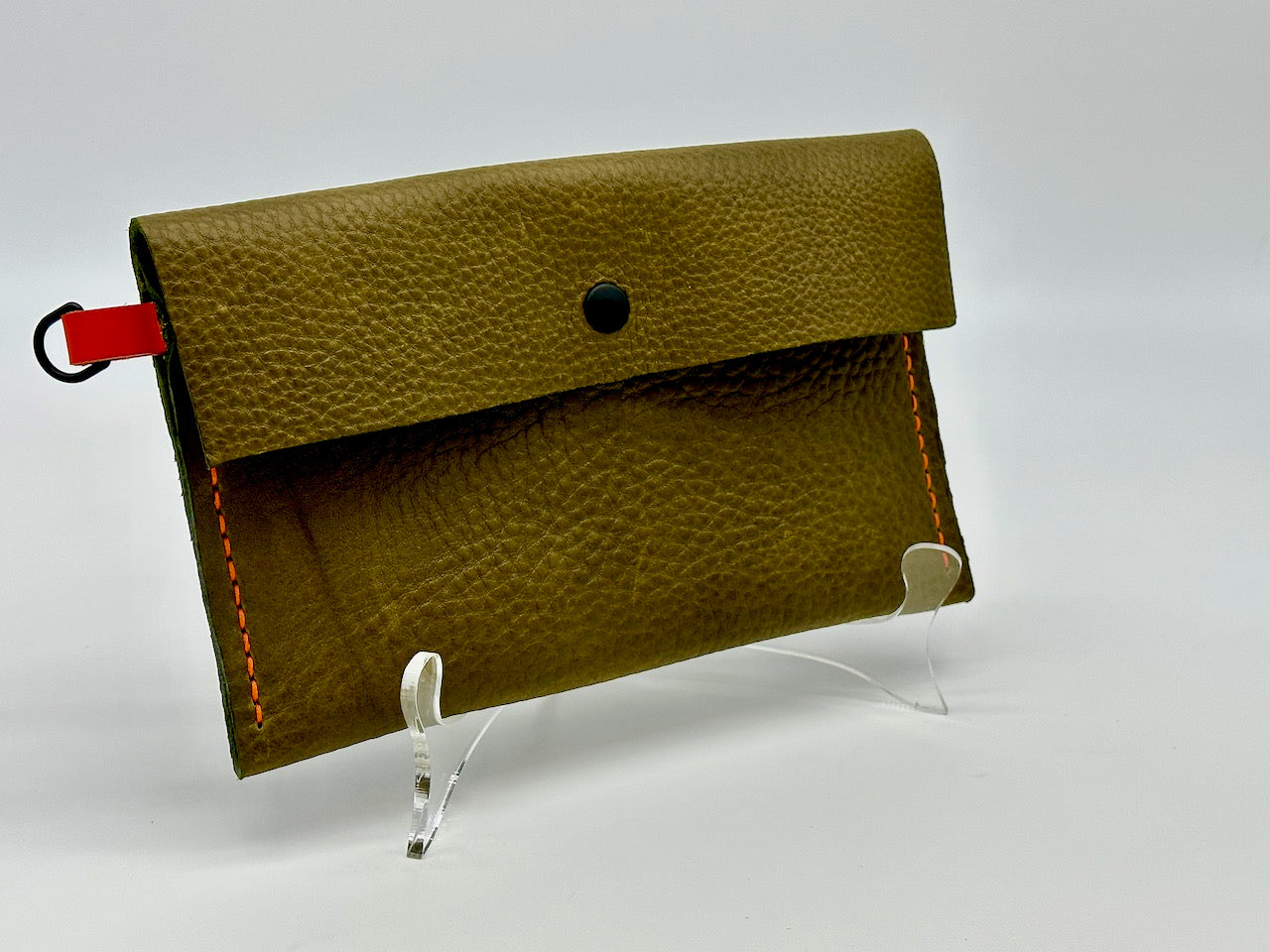 "Pop of Color Wristlet" in Olive Green and Orange