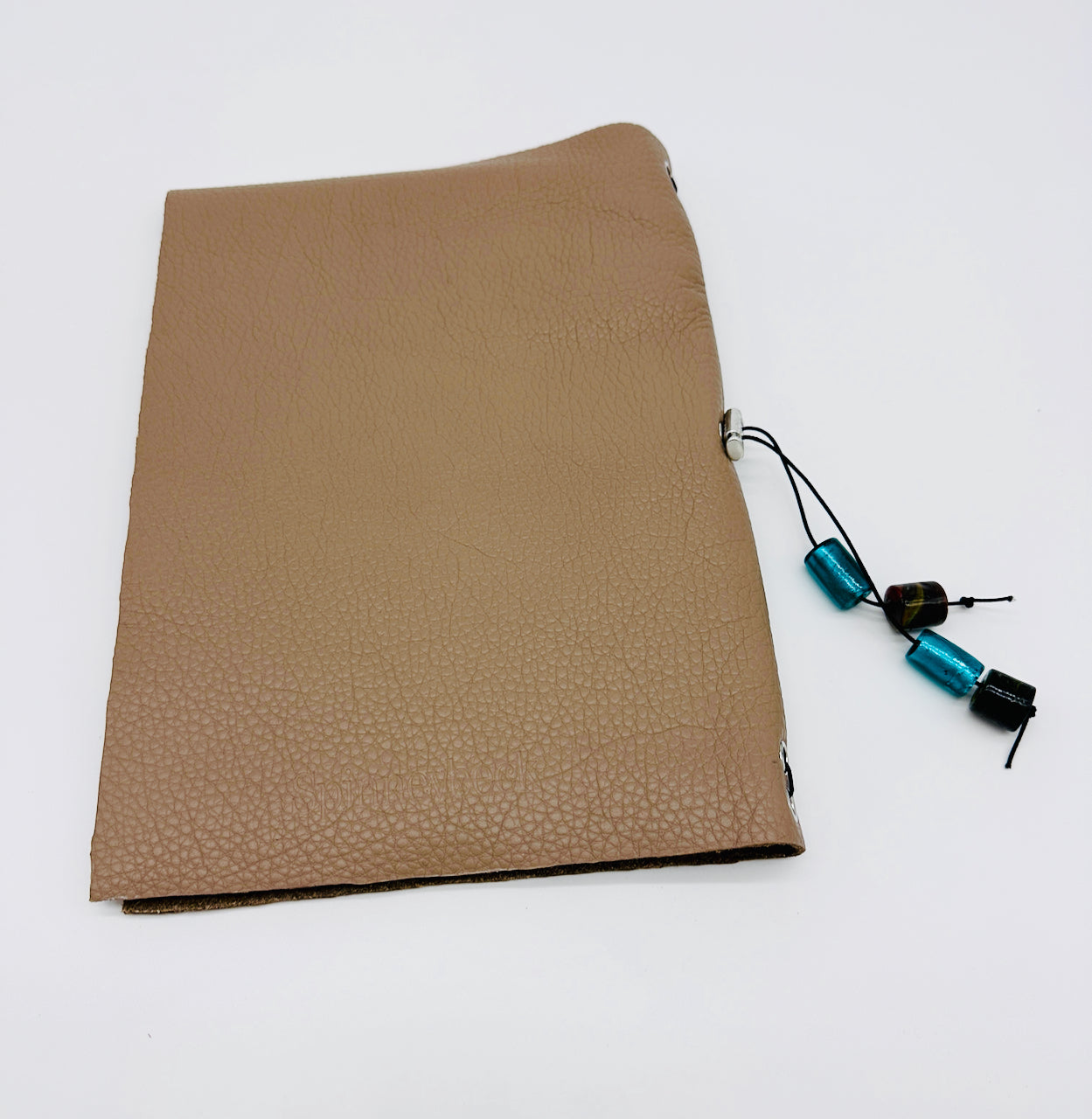 back cover of leather journal by undercover popular leather goods