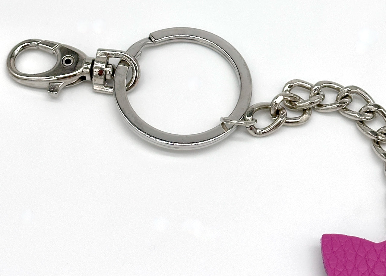 detail of silver key chain and lobster clasp hardware