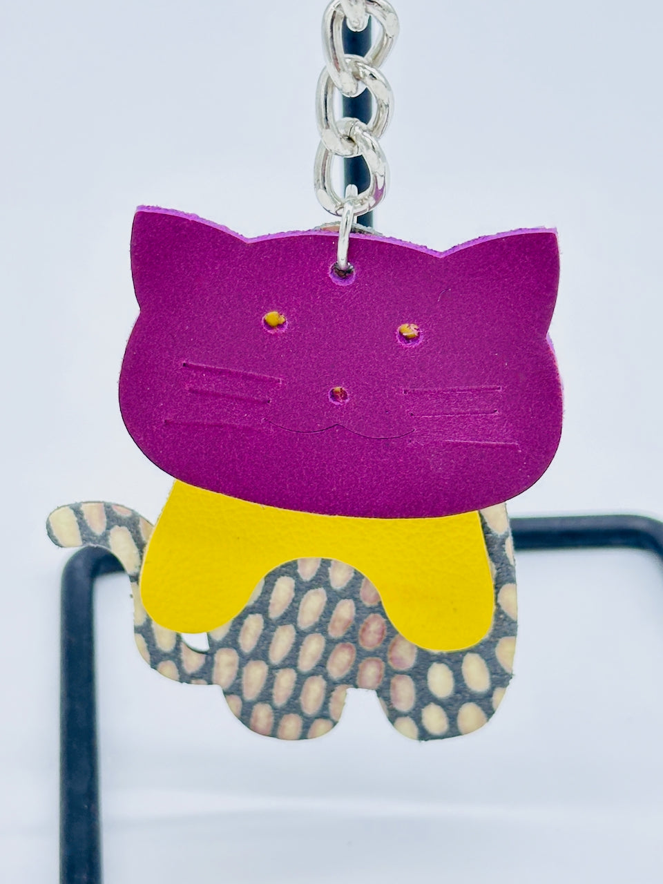 closeup of cat leather key chain purse fob