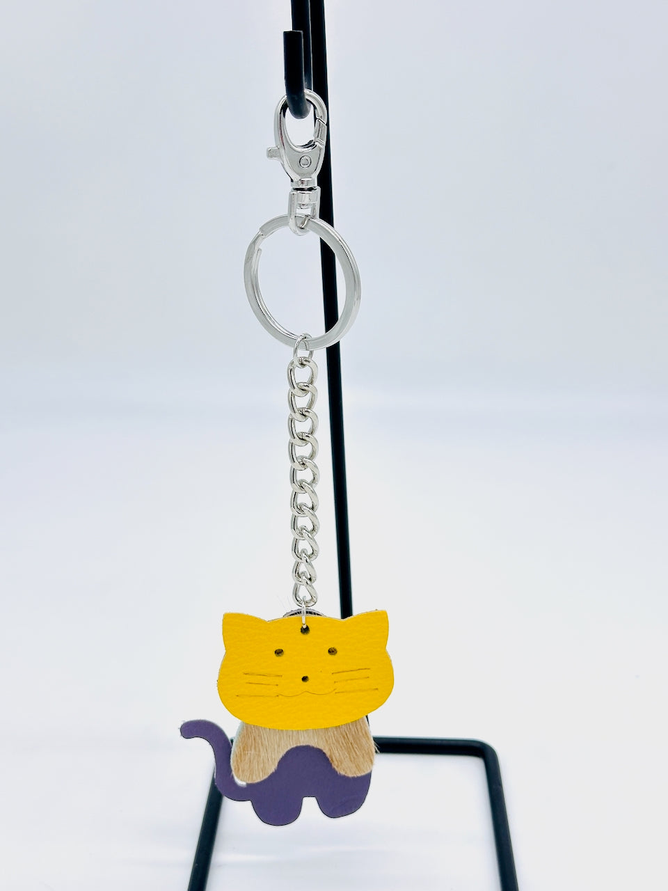 hanging cat key chain purse fob made of yellow, purple and tan leather