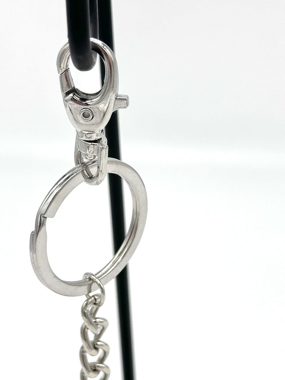 detail of silver keychain lobster clasp hardware