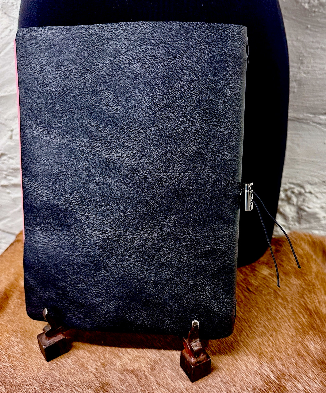 back cover of black leather journal