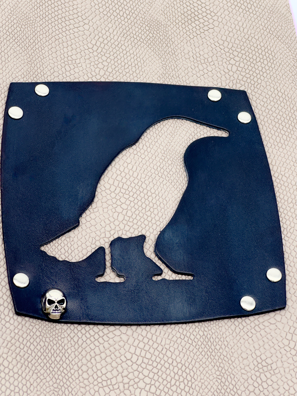 cut out leather bird on journal cover