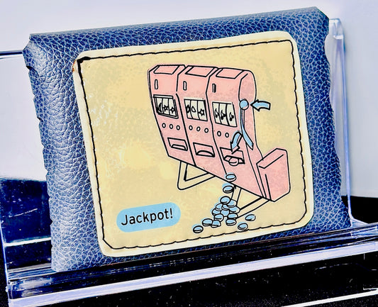 Blue leather wallet with a cartoon slot machine design featuring the word 'Jackpot!'.