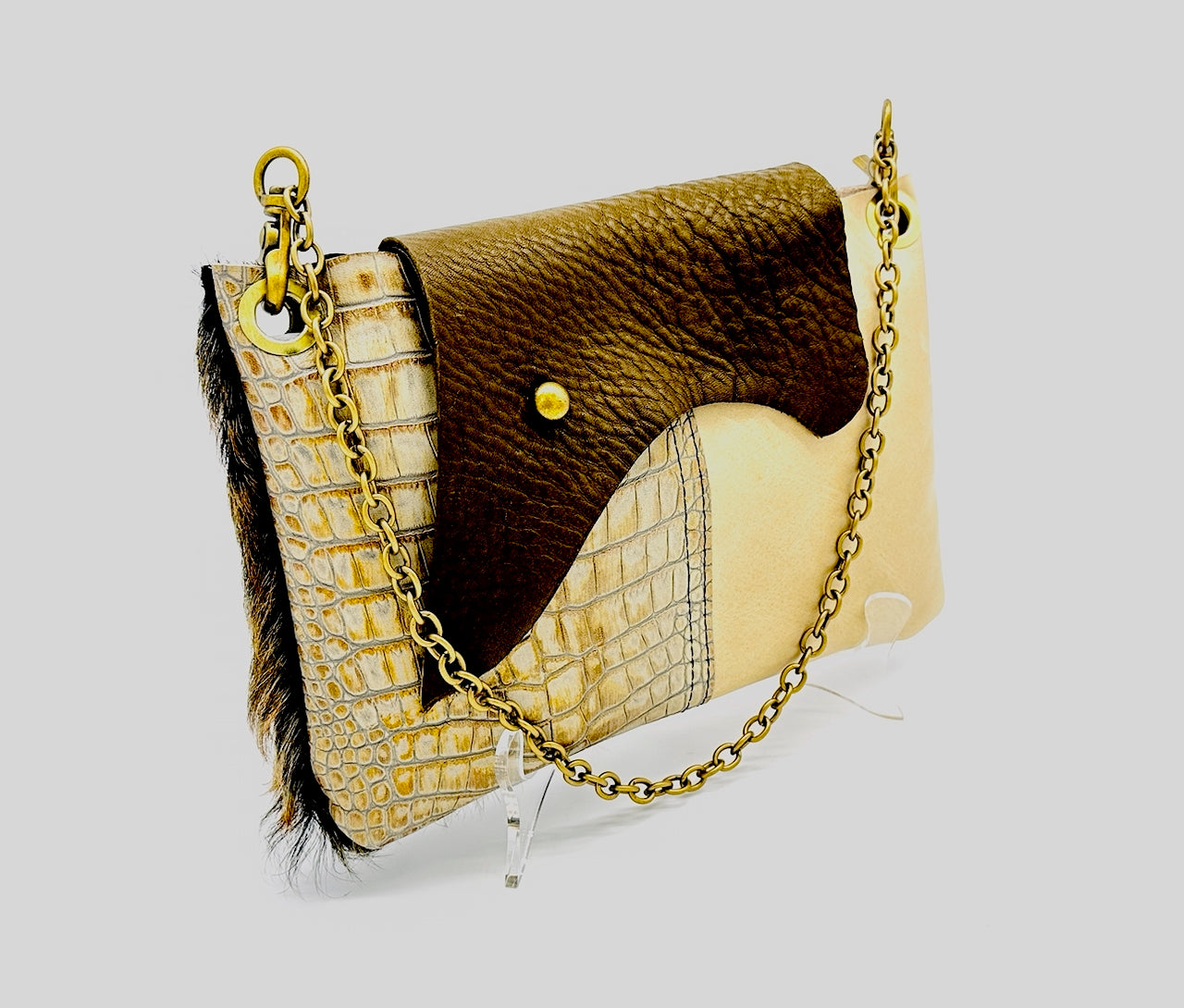 Leather Purse on easel with gold chain 