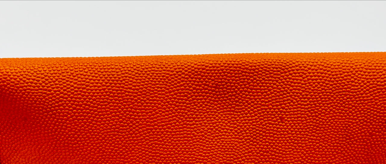 Close-up of orange textured leather