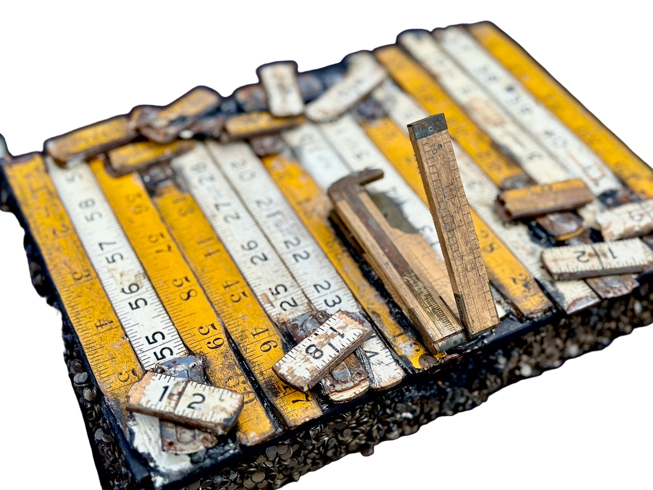 Collection of vintage rulers on a dark background