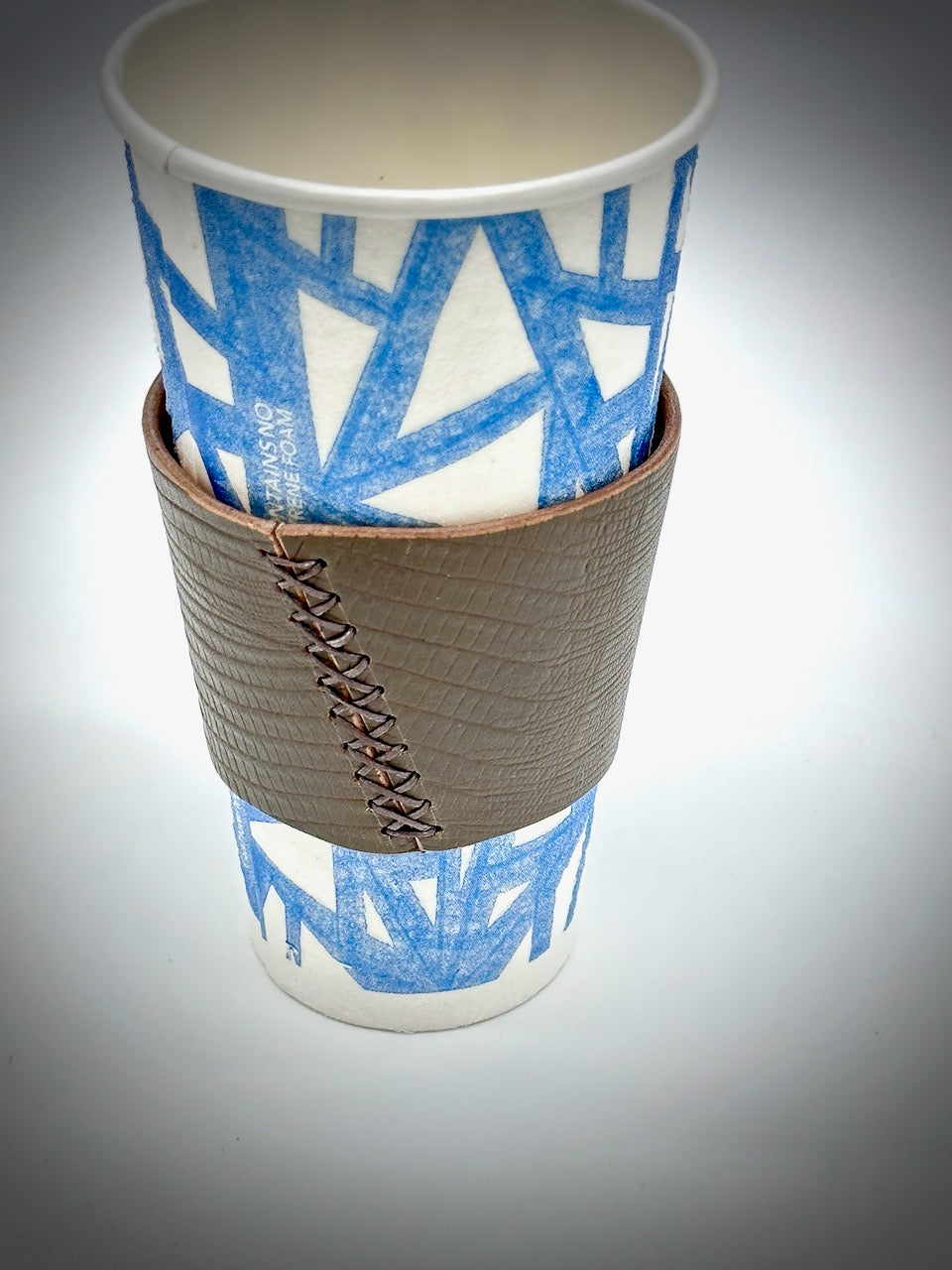gray leather coffee sleeve