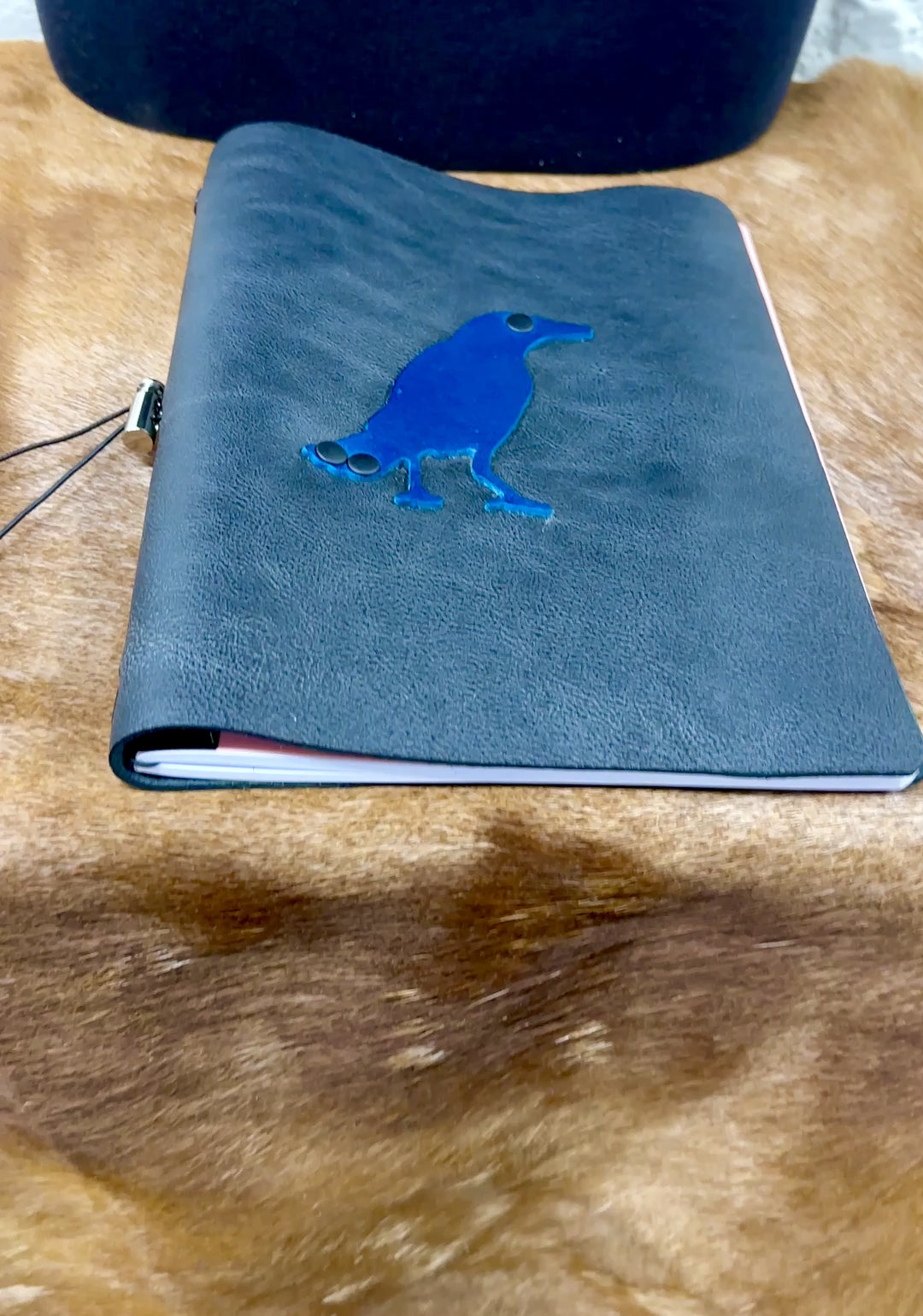 video showing journal covers and paper notebook insert