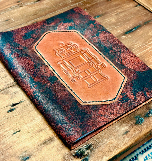 robbie robot leather refillable journal on wood table